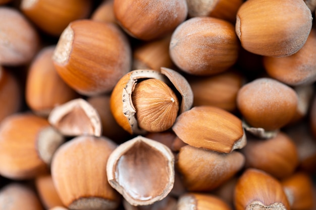 Hazelnut.Food background, photo wallpaper. Full page of nuts forming the background texture. Hazelnuts background. Close-ups of nuts.