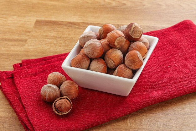 Photo hazelnut heap in the bowl