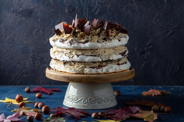 Hazelnut meringue cake with coffee cream and chocolate