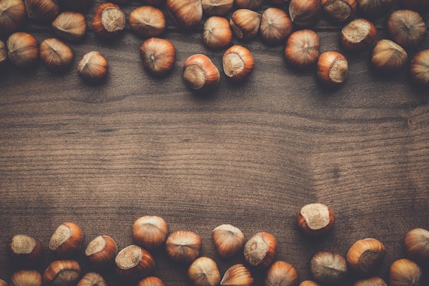 Hazelnuts on the brown wooden table