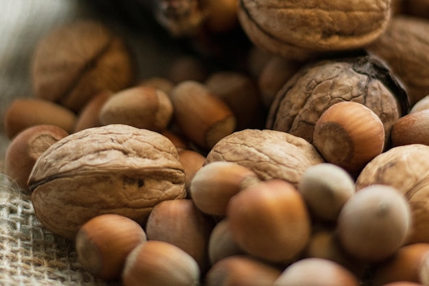 hazelnuts on a burlap cloth background