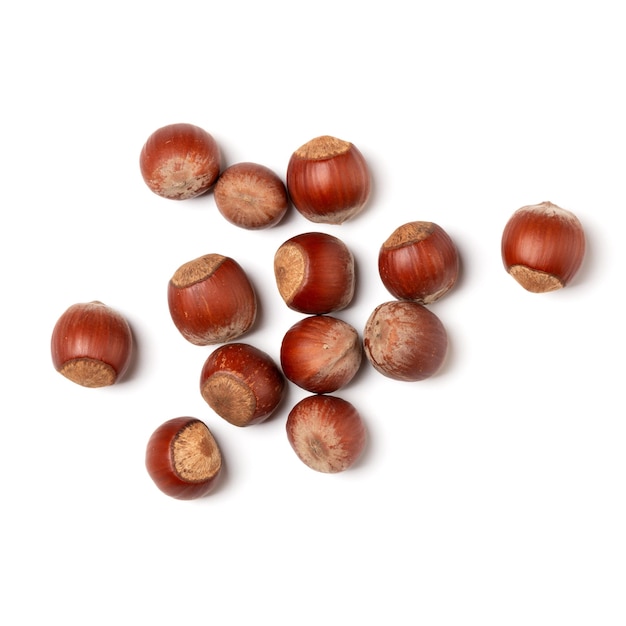 Hazelnuts isolated on white background closeup Food concept Top view flat lay