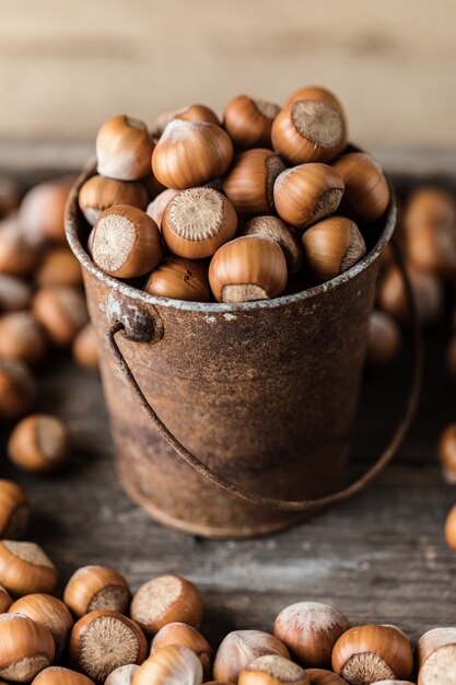 Hazelnuts on rustic wooden table