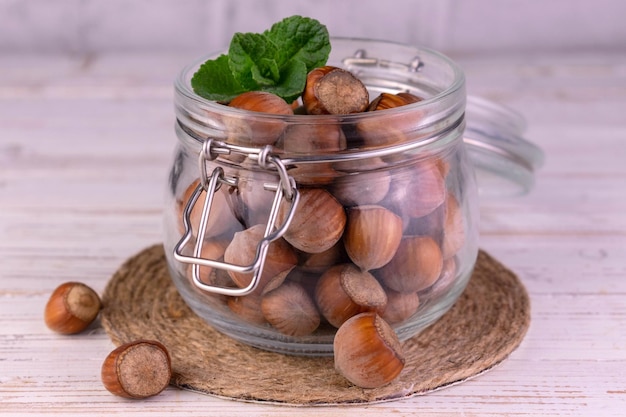 Hazelnuts in a shell in a glass jarCloseup