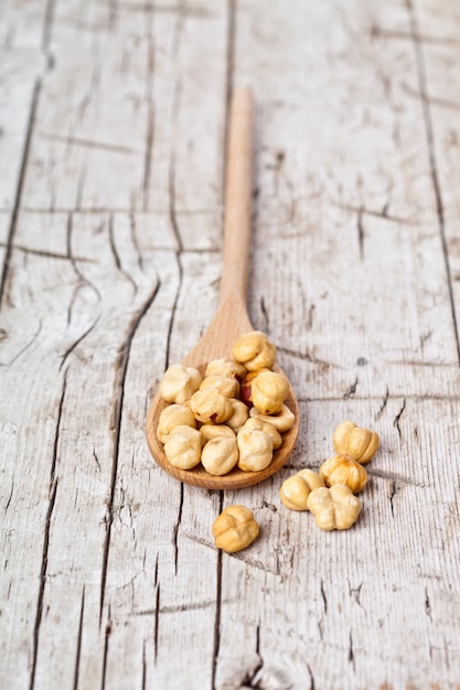 Hazelnuts in wooden spoon 