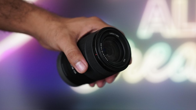 HD picture of A camera lens in hand