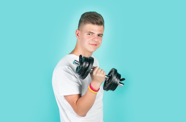 He has power healthy lifestyle concept of fitness child workout with dumbbell