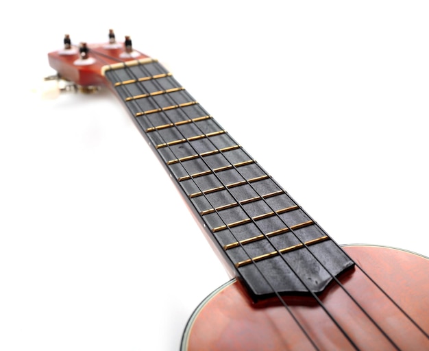 사진 화이트 절연 하와이 어쿠스틱 기타의 머리와 목 부분