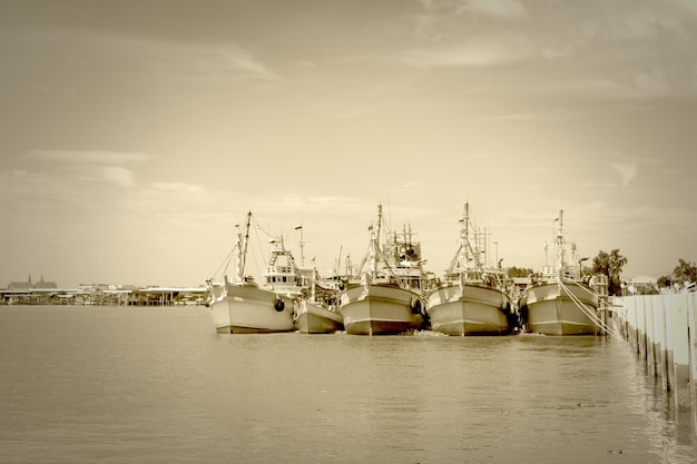 head fishing boat in the riversepia tone