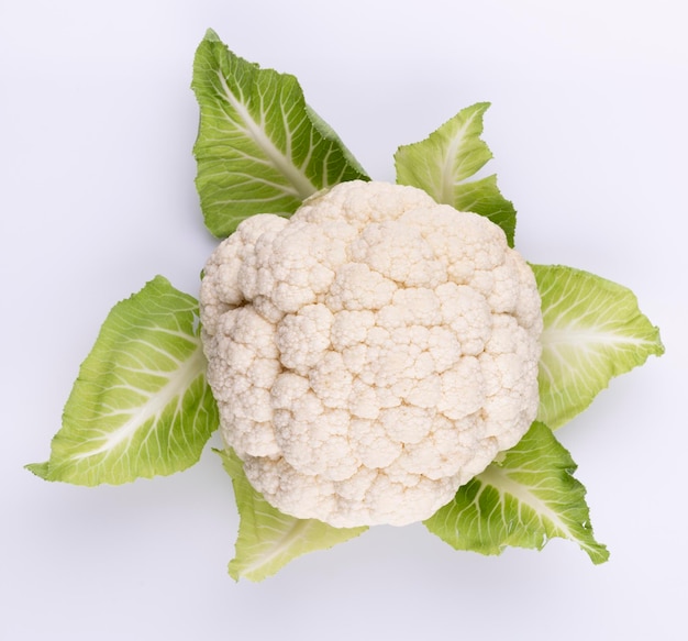 A head of fresh cauliflower. Healthy eating and vegetarianism. Color background.