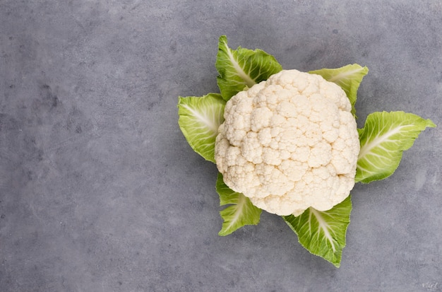 A head of fresh cauliflower. Healthy eating and vegetarianism