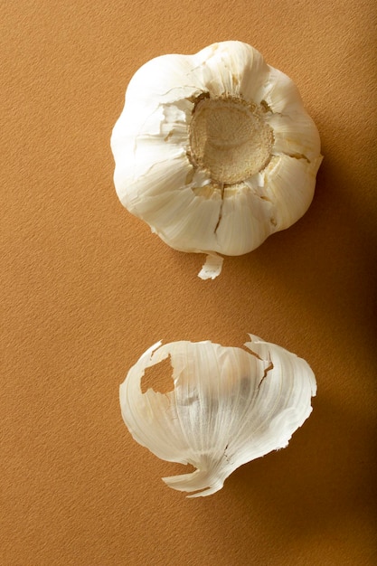 A head of garlic and peel