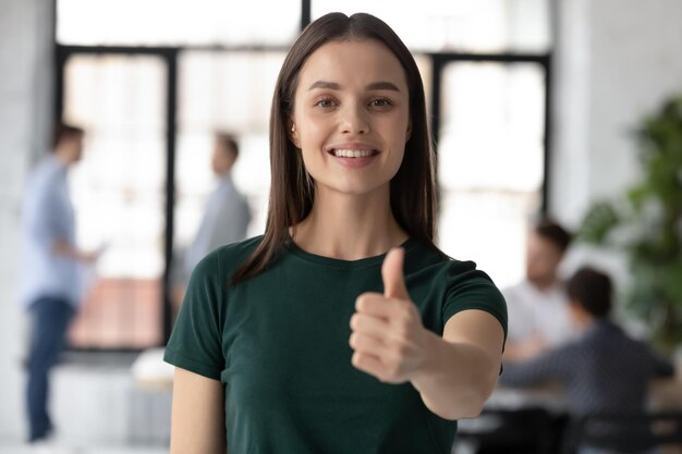 Head shot portrait close up smiling businesswoman hr manager\
pointing finger at you looking at camera satisfied recruiter\
choosing job candidate new career opportunity recruitment and\
employment