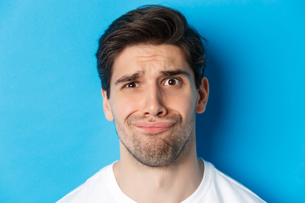 Head shot of skeptical and disappointed man