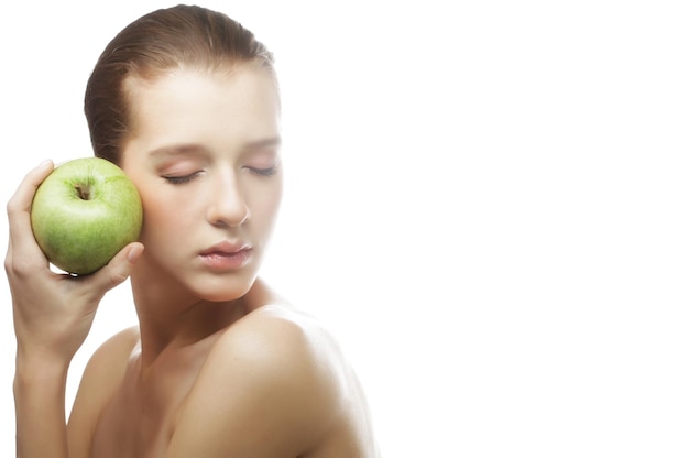 Photo head shot of woman holding apple