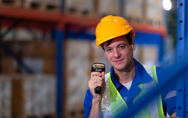 Head of worker in an auto parts warehouse Examine auto parts