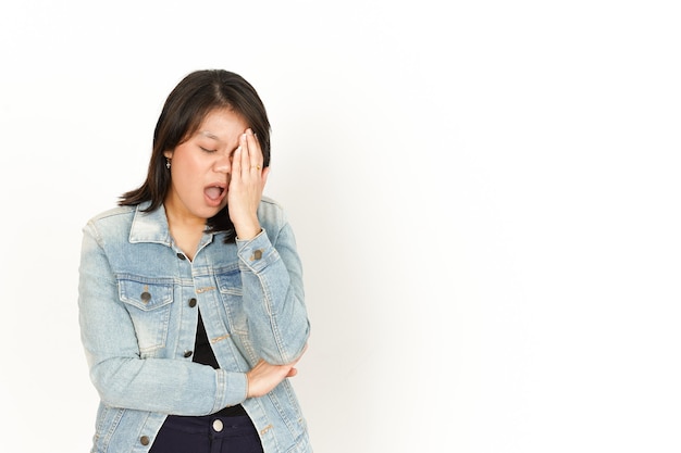Headache of Beautiful Asian Woman Wearing Jeans Jacket and black shirt Isolated On White Background
