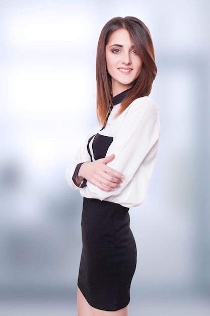 Headache Businesswoman with his hands on her head isolated over white backgroundn