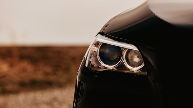 Headlights of modern prestigious black car