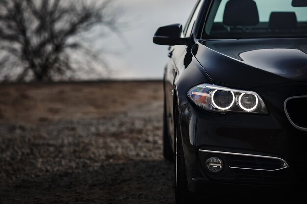 Headlights of modern prestigious black car