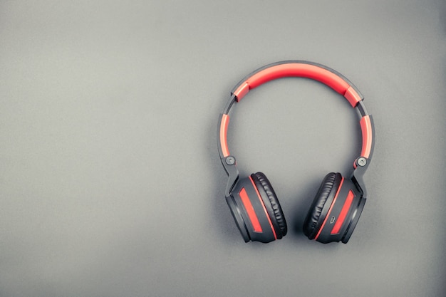 Headphone on black table in vintage tone