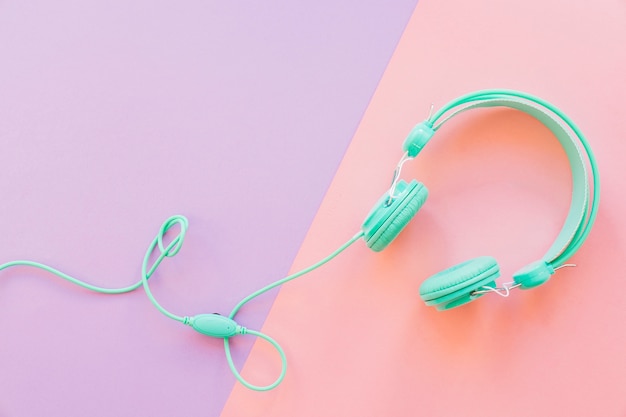 Photo headphone on purple and pink background