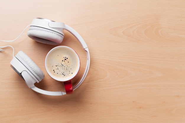 Headphones and coffee cup