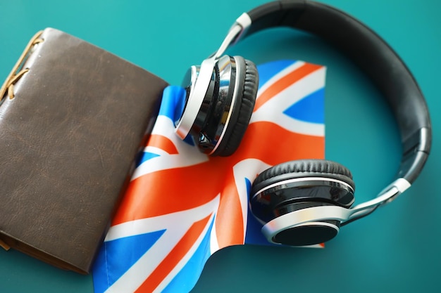 Headphones and flag the study of foreign subjects audiobooks in\
a foreign language language classes listening