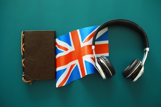 Headphones and flag The study of foreign subjects Audiobooks in a foreign language Language classes Listening