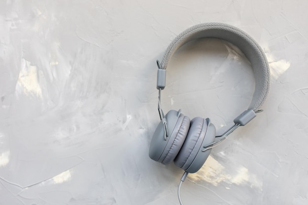 Photo headphones on gray background copy space