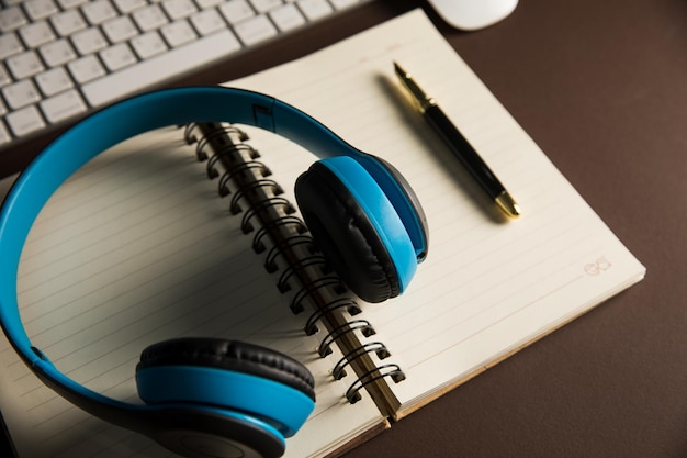 Headphones and notepad