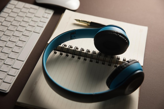 Headphones and notepad