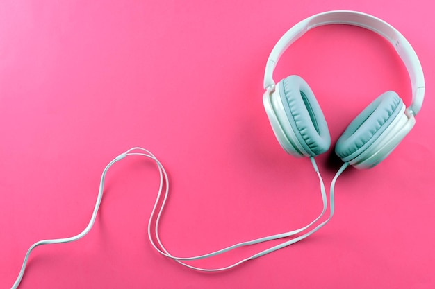 Photo headphones on pink background