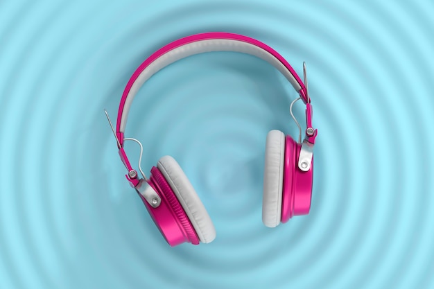 Photo headphones with audio waves on blue surface