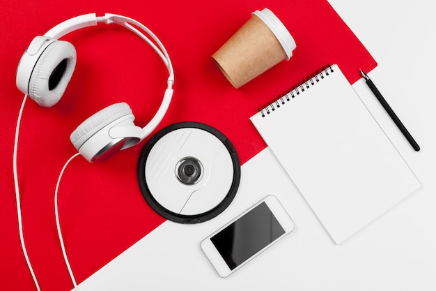 Headphones with cord on red and white color