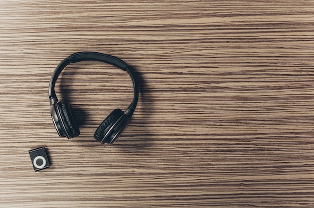 Headphones on wooden surface