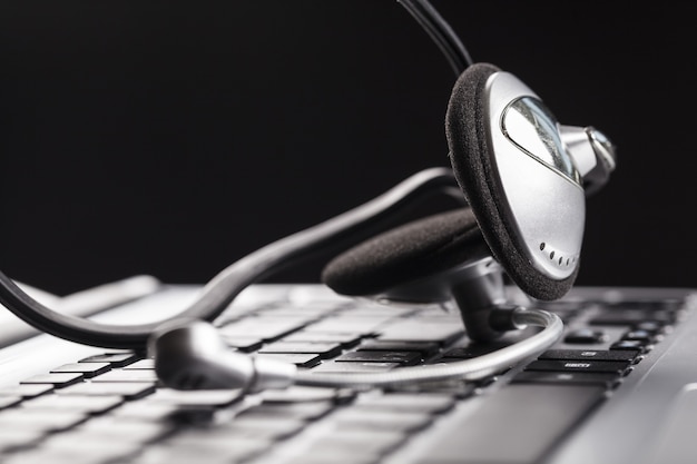 Headset on a laptop computer, close-up view