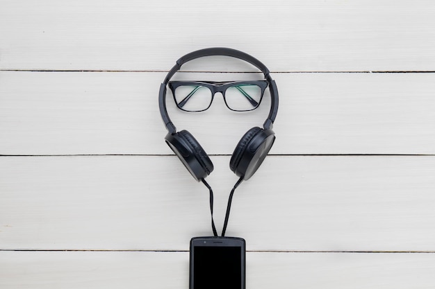 Photo headset with mobile phone on the table