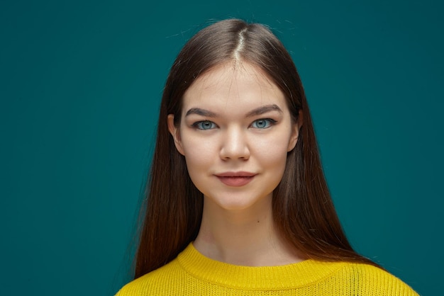 Headshot of beautiful modern young girl with healthy long hair smooth skin haircare cosmetics