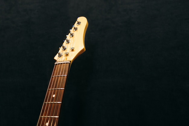 Photo headstock of the six-string electric guitar