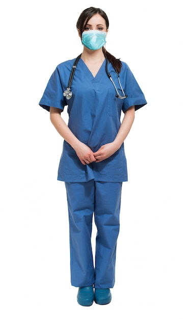 Healtcare worker with stethoscope isolated on white wearing a mask