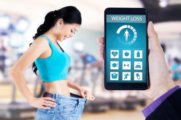 Health app with woman wearing old jeans