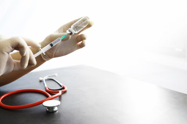 Health care concept EU flag and stethoscope on a gray background Vaccination and epidemic