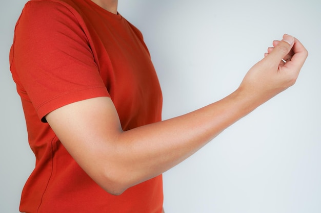 健康コンセプト 肘の痛みのある人 肘に手を握る人 骨の痛みのある関節炎