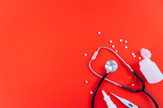 Photo health concept. pills, protective mask, stethoscope