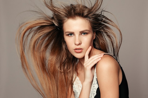 Health, people and beauty concept - Model blonde girl. Beautiful brown hair Girl. Healthy Long Hair. Pretty spa model girl with perfect fresh clean skin. Youth and skin care concept