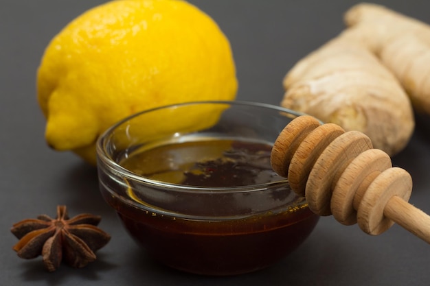 Health remedy foods for cold and flu relief on a black background