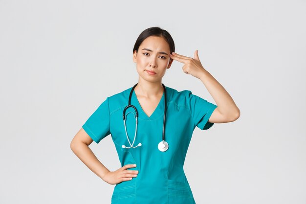 Healthcare Asian female posing