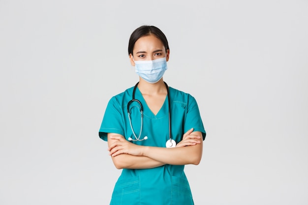 Healthcare asian nurse posing