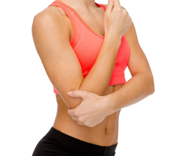 healthcare, fitness and medicine - sporty woman with pain in elbow